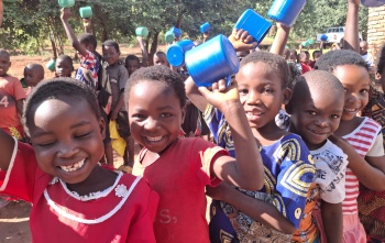 Children eating Mary's Meals in Malawi
