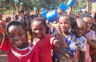 Children eating Mary's Meals in Malawi