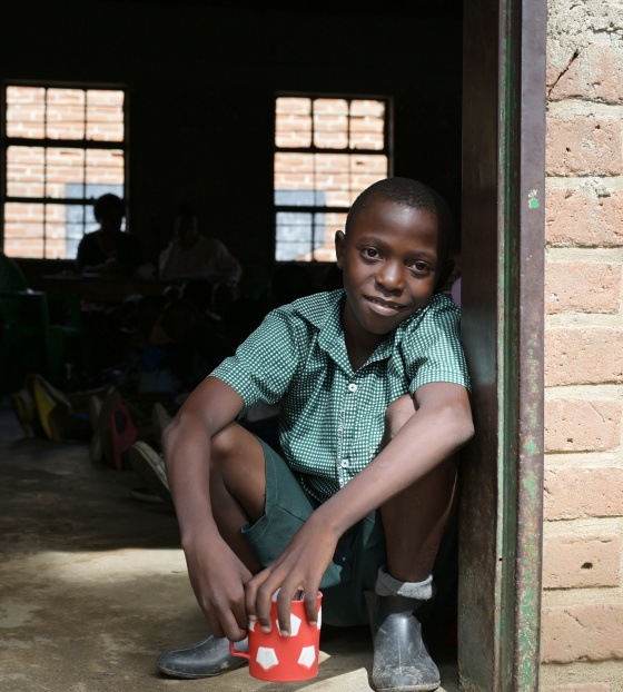 Boy in school in Malawi